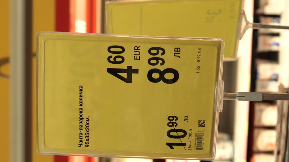 Yellow shelf price tags in a shop